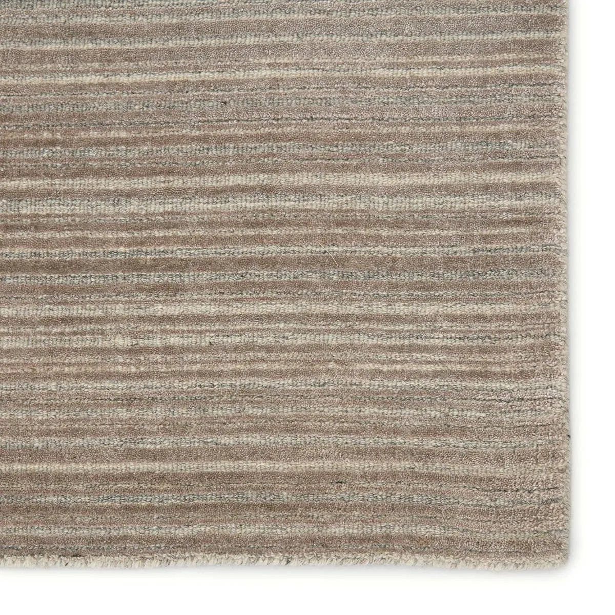 Featuring Second Sunset  Gradient Rug by Jaipur Living at Amethyst Home. The easy-to-decorate, earthy tones of the Second Sunset Gradient prove that simplicity can sometimes be striking. The Gradient rug is hand loomed of durable wool and jasmine for a sumptuous and inviting hand. The variation in the cool brown, gray, and light taupe tones of this lustrous. Amethyst Home provides interior design, new home construction design consulting, vintage area rugs, and lighting in the San Diego metro area.