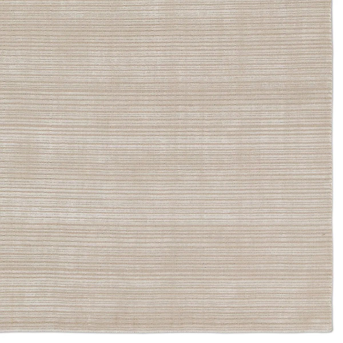 Featuring Second Sunset Gradient Rug by Jaipur Living at Amethyst Home. The easy-to-decorate, earthy tones of the Second Sunset Gradient prove that simplicity can sometimes be striking. The Gradient rug is hand loomed of durable wool and jasmine for a sumptuous and inviting hand. The variation in ivory and cream colors of this lustrous rug creates stunning dept. Amethyst Home provides interior design, new home construction design consulting, vintage area rugs, and lighting in the Tampa metro area.