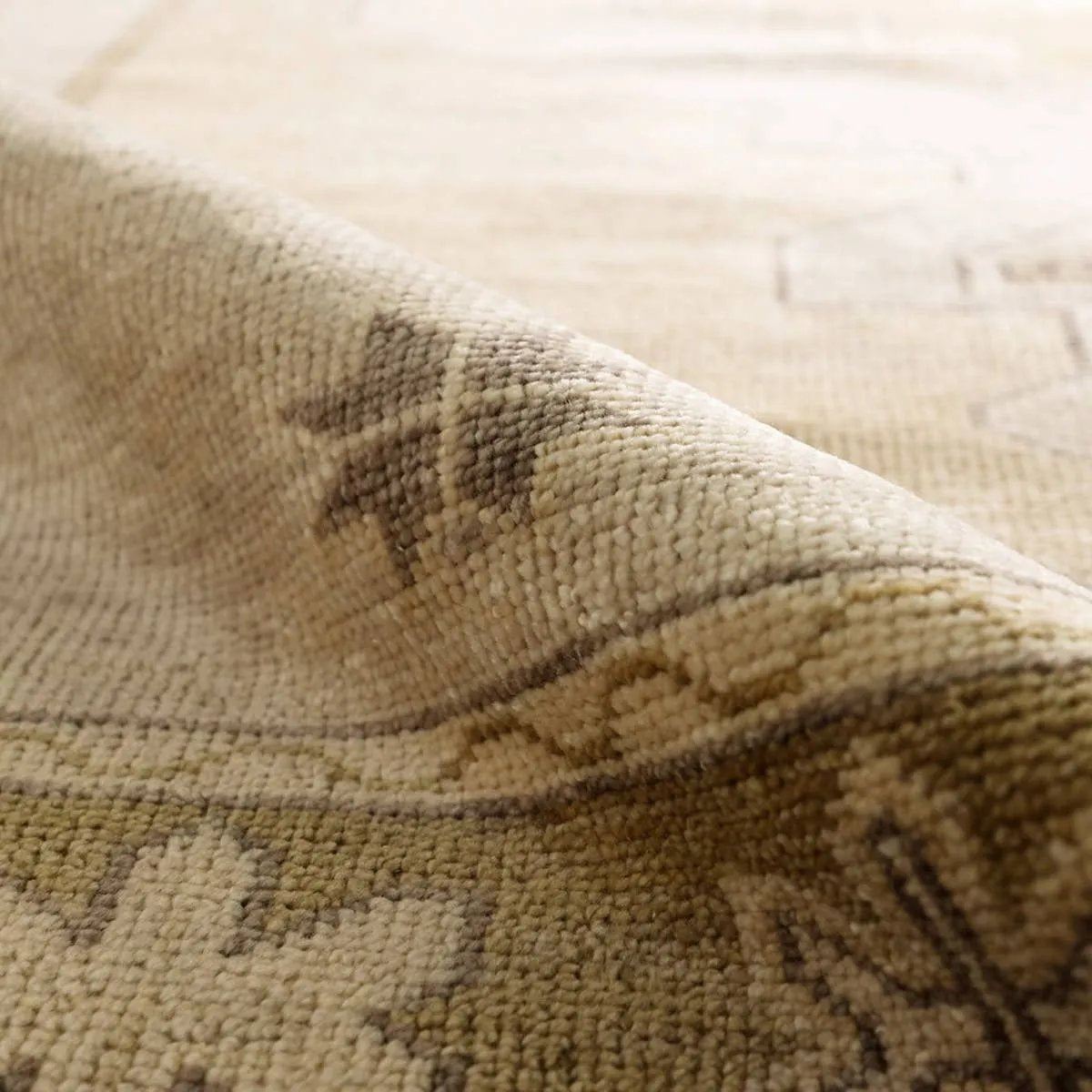 Featuring Sprig Hand-Knotted Rug by Jaipur Living at Amethyst Home. The Salinas Sprig is punctuated by vibrant hues and intricate details, bringing a bold, transitional look to any home. The hand-knotted Sprig rug expresses classic style with an intricate center medallion and surrounding border. Subtle tones of yellow and gold lend warmth and versatilit. Amethyst Home provides interior design, new home construction design consulting, vintage area rugs, and lighting in the Newport Beach metro area.