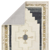 Featuring Stellar Rug by Jaipur Living at Amethyst Home. The Stellar design merges timeless tradition with a vintage-inspired aesthetic. Featuring a striking central medallion, this rug is set against an elegant beige and black backdrop, accented by rich green detailing. Its classic pattern, paired with a gently distressed finish, creates an heirloom quality.H. Amethyst Home provides interior design, new home construction design consulting, vintage area rugs, and lighting in the Dallas metro area.