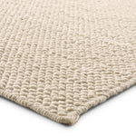 Featuring Rebecca Taya Rug by Jaipur Living at Amethyst Home. Contemporary and versatile, the eco-friendly Rebecca Taya offers a sophisticated solid design to medium-traffic areas and outdoor spaces. Delivering a fresh accent to patios, kitchens, and dining rooms, the Rebecca is handwoven with ultra-durable PET yarn. With a looped texture and neutral white col. Amethyst Home provides interior design, new home construction design consulting, vintage area rugs, and lighting in the Austin metro area.