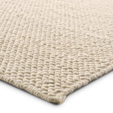 Featuring Rebecca Taya Rug by Jaipur Living at Amethyst Home. Contemporary and versatile, the eco-friendly Rebecca Taya offers a sophisticated solid design to medium-traffic areas and outdoor spaces. Delivering a fresh accent to patios, kitchens, and dining rooms, the Rebecca is handwoven with ultra-durable PET yarn. With a looped texture and neutral white col. Amethyst Home provides interior design, new home construction design consulting, vintage area rugs, and lighting in the Austin metro area.