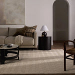 Featuring Tokaree Rowena Rug by Jaipur Living at Amethyst Home. Reminiscent of a basketweave, The Tokaree Rowena demonstrates sophistication and simplicity in a tonal taupe checker pattern.  Handwoven of 100% wool, varied pile height creates a unique texture and luxurious depth while maintaining durability and quality that are synonymous with our artisans i. Amethyst Home provides interior design, new home construction design consulting, vintage area rugs, and lighting in the Nashville metro area.