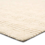 Featuring Tokaree Rowena Rug by Jaipur Living at Amethyst Home. Reminiscent of a basketweave, The Tokaree Rowena demonstrates sophistication and simplicity in a tonal taupe checker pattern.  Handwoven of 100% wool, varied pile height creates a unique texture and luxurious depth while maintaining durability and quality that are synonymous with our artisans in . Amethyst Home provides interior design, new home construction design consulting, vintage area rugs, and lighting in the Seattle metro area.