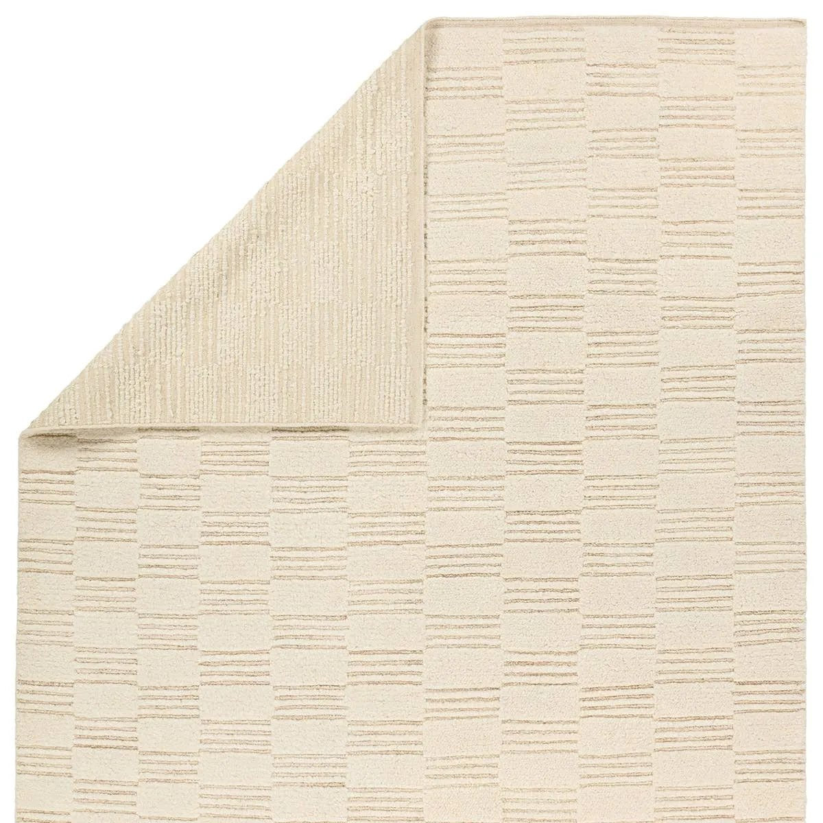 Featuring Totto Hand-Knotted Rug by Jaipur Living at Amethyst Home. A contemporary twist on traditional Afghani hand-knotted textiles. The Keoka is crafted entirely from wool, featuring a ribbed construction that accentuates its dynamic checkerboard pattern with unique linear details. Complete with a dhurrie border, the Totto design adds a touch of glob. Amethyst Home provides interior design, new home construction design consulting, vintage area rugs, and lighting in the Newport Beach metro area.