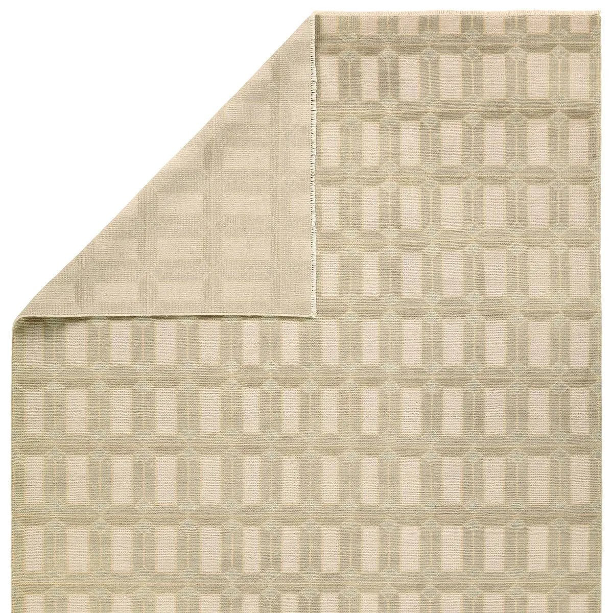 Featuring Vaila Hand-Knotted Rug by Jaipur Living at Amethyst Home. The Vaila design reinvents timeless geometric grid patterns, fusing classic charm with a modern edge. Soft beige tones elevate any mid-century modern space, while naturally stain-resistant wool handles medium-traffic areas, kids, and pets with ease. A durable yet stylish foundation, this . Amethyst Home provides interior design, new home construction design consulting, vintage area rugs, and lighting in the Kansas City metro area.
