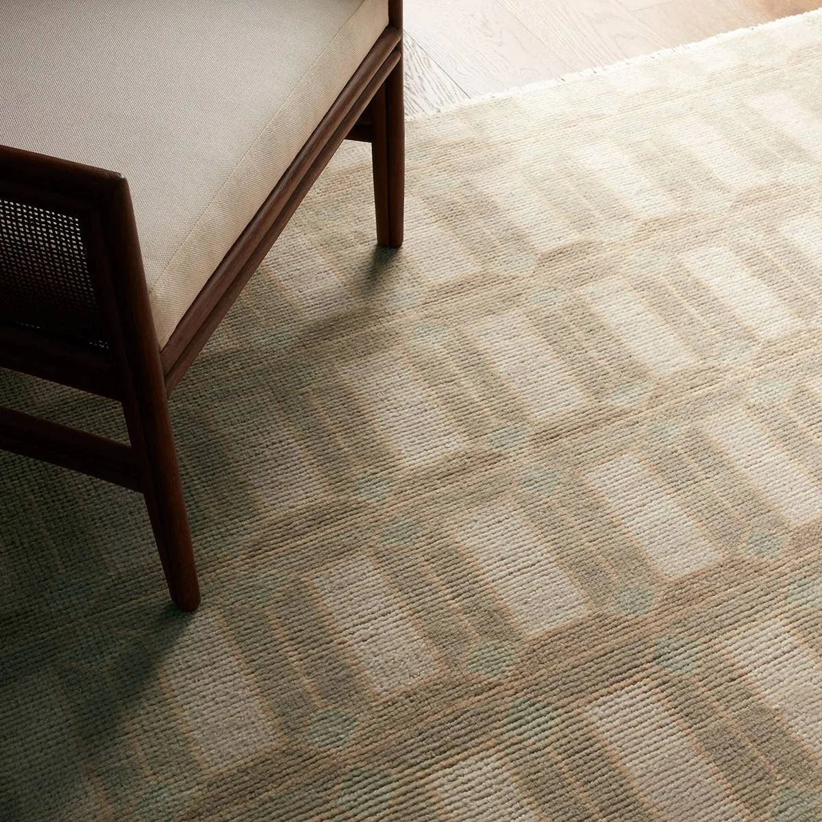 Featuring Vaila Hand-Knotted Rug by Jaipur Living at Amethyst Home. The Vaila design reinvents timeless geometric grid patterns, fusing classic charm with a modern edge. Soft beige tones elevate any mid-century modern space, while naturally stain-resistant wool handles medium-traffic areas, kids, and pets with ease. A durable yet stylish foundation, this piece . Amethyst Home provides interior design, new home construction design consulting, vintage area rugs, and lighting in the Omaha metro area.