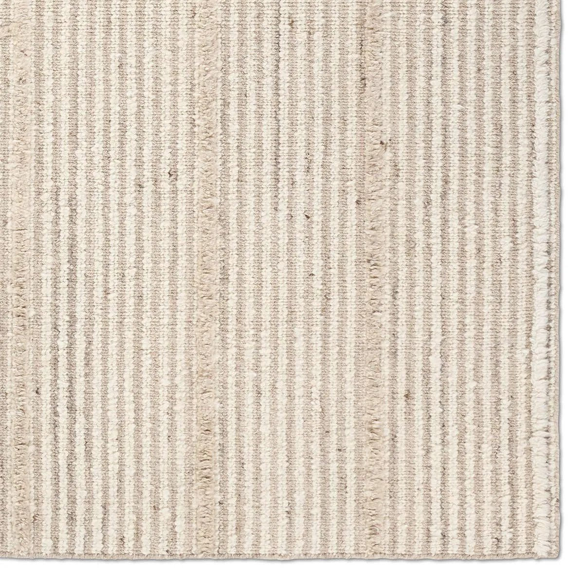 Featuring Verena Rug by Jaipur Living at Amethyst Home. Earthy white and beige tones come together in a grounding linear design, infusing the Verena rug with contemporary elegance. Handwoven from a luxe wool pile, its luminous sheen highlights every intricate detail.Handwoven90% Wool 10% CottonRIM02 Rimal VerenaBlot stains immediately and clean with a mild soap. Amethyst Home provides interior design, new home construction design consulting, vintage area rugs, and lighting in the Omaha metro area.