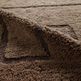 Featuring Ziyan Rug by Jaipur Living at Amethyst Home. With its neutral brown hue and modern geometric pattern, the Aibel Ziyan adds a contemporary touch to your space. Hand-tufted from washable wool and offering plush comfort, it’s ideal for kids’ rooms or any area where spills are bound to happen. Here’s a stylish, worry-free solution that can handle the dem. Amethyst Home provides interior design, new home construction design consulting, vintage area rugs, and lighting in the Boston metro area.