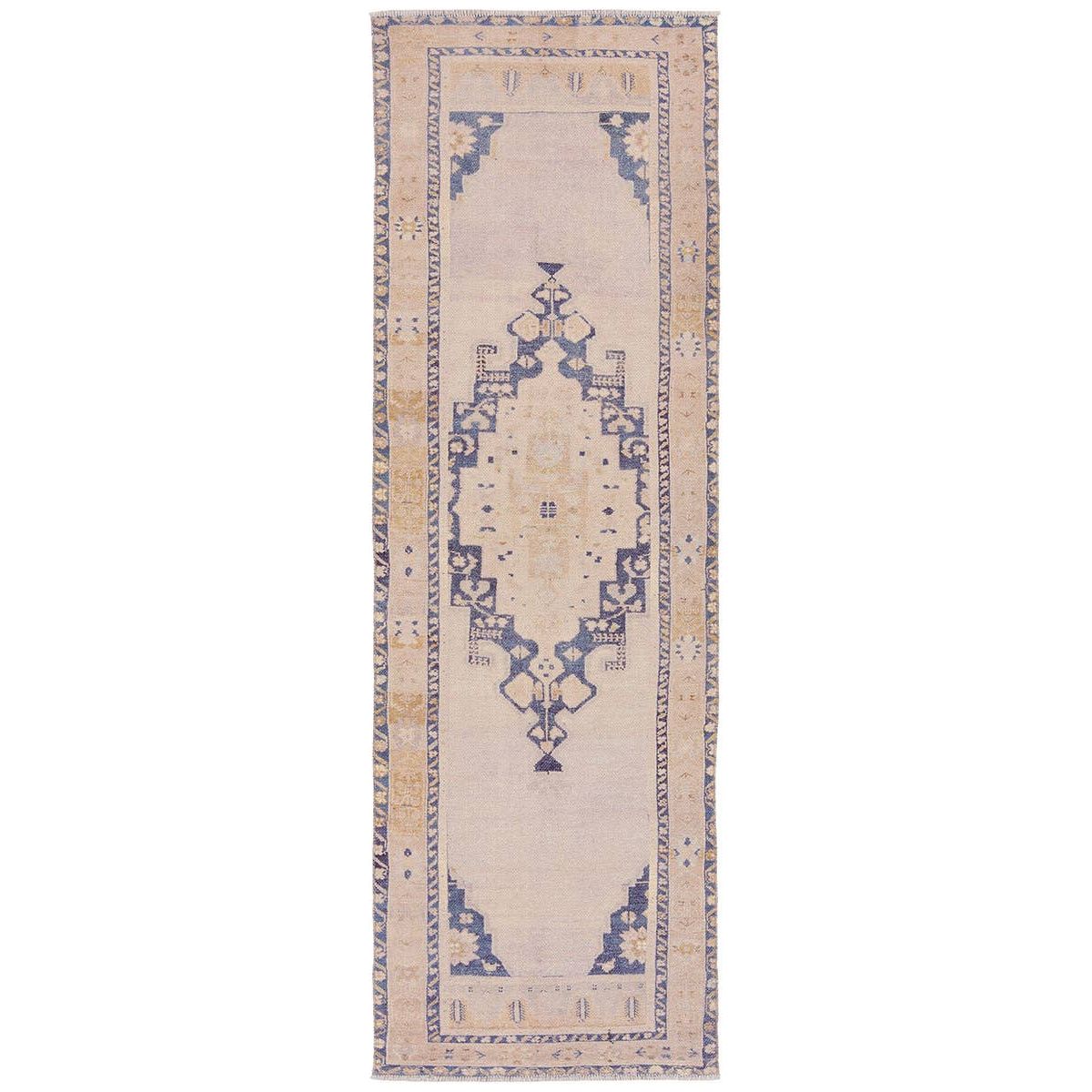 Featuring Lumal Debolo Rug by Jaipur Living at Amethyst Home. Distressed, vintage designs offer an elevated tone for the Lumal Collection. The Debolo rug features a vintage-inspired medallion, geometric border, and floral detailing in tones of tan, blue, yellow, and gray. This machine washable rug is stain resistant and easy to clean, perfect for home.  Amethyst Home provides interior design, new home construction design consulting, vintage area rugs, and lighting in the Salt Lake City metro area.