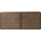 Featuring Leo Rustic Grey 6 Drawer Dresser by Four Hands at Amethyst Home. Designed by Thomas Bina and Ronald Sasson, a design partnership blending both modern minimalist and Brazilian influences. Crafted from solid oak, this clean-lined dresser features vertical reed detailing on the drawer fronts with wooden pull detailing on the outer edges. Drawers are . Amethyst Home provides interior design, new home construction design consulting, vintage area rugs, and lighting in the San Diego metro area.