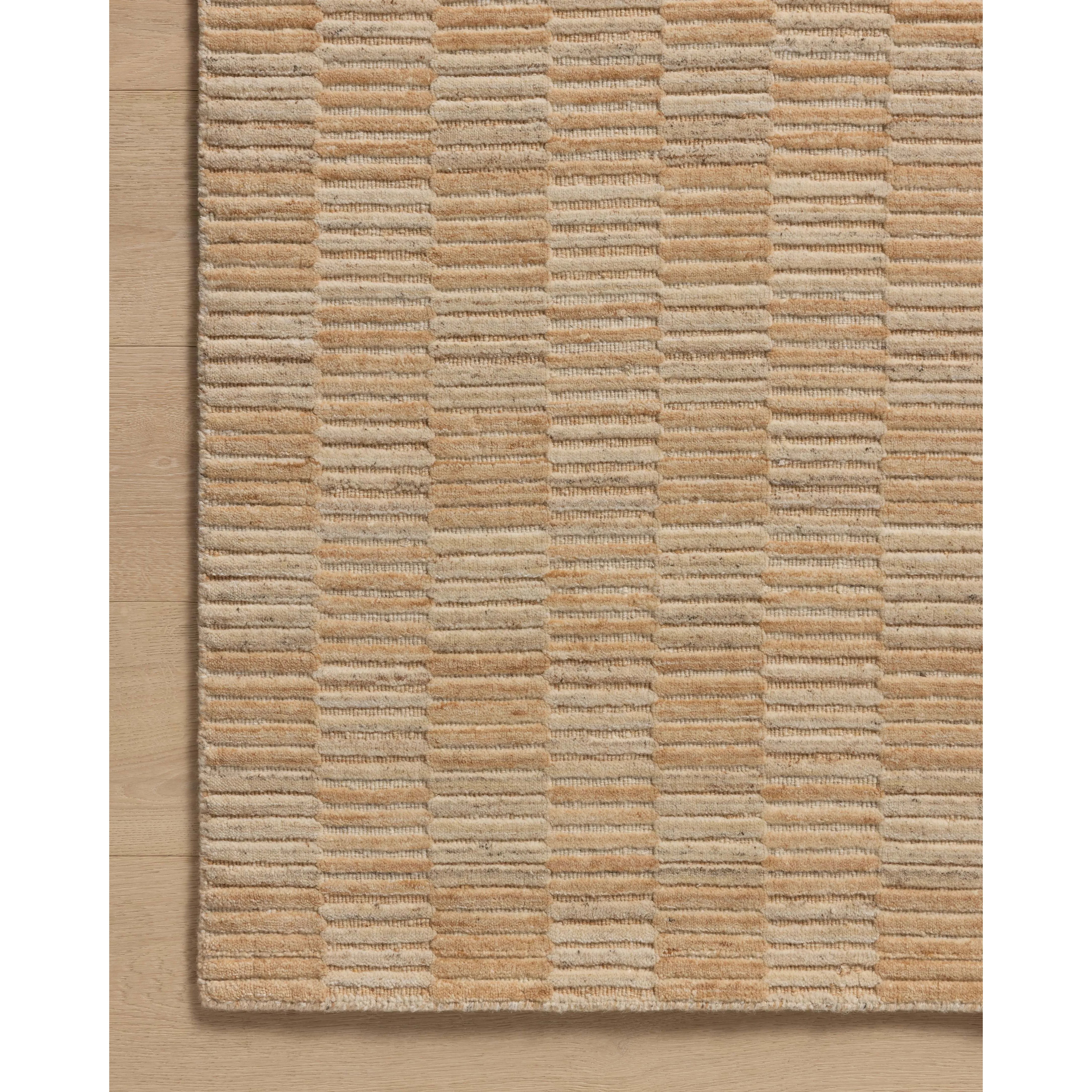 Featuring Amber Lewis x Loloi Marlowe Clay / Natural Rug by Loloi at Amethyst Home. The Marlowe Collection by Amber Lewis x Loloi is a handmade area rug with a coastal-inspired gridded design in natural color palettes. The rugs muted pattern adds understated depth with a durable, thick pile. This collection is hand-loomed of wool in India and Goodweave-ce. Amethyst Home provides interior design, new home construction design consulting, vintage area rugs, and lighting in the Kansas City metro area.