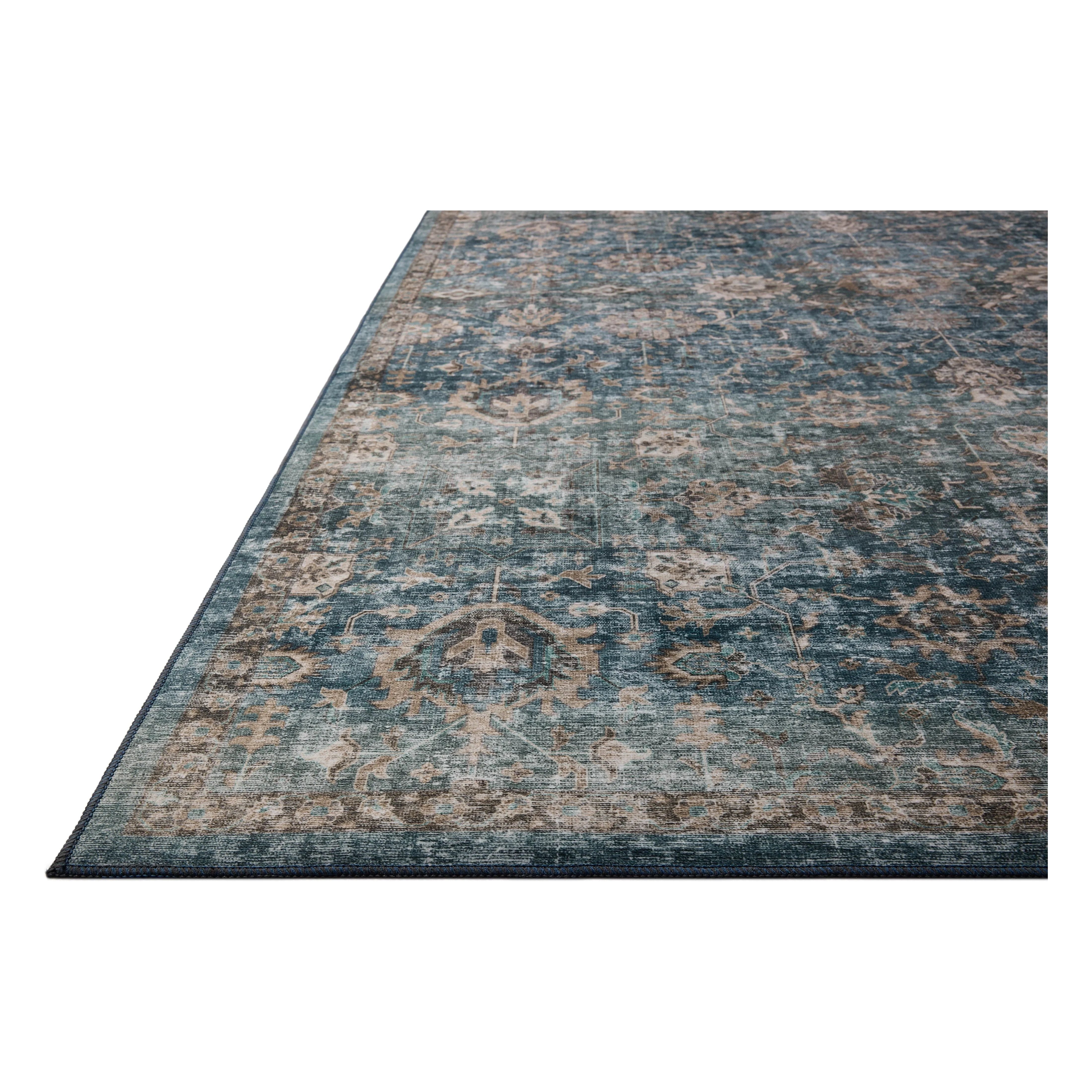 Featuring Anniston Machine Washable Lagoon / Natural Rug by Loloi at Amethyst Home. The Anniston Collection is a washable rug with traditional motifs in beautifully saturated and distressed tones. This durable area rug is power-loomed of polyester in China and designed for the busiest rooms of the home—living rooms, bedrooms, kitchens, hallways, and more. It c. Amethyst Home provides interior design, new home construction design consulting, vintage area rugs, and lighting in the Austin metro area.