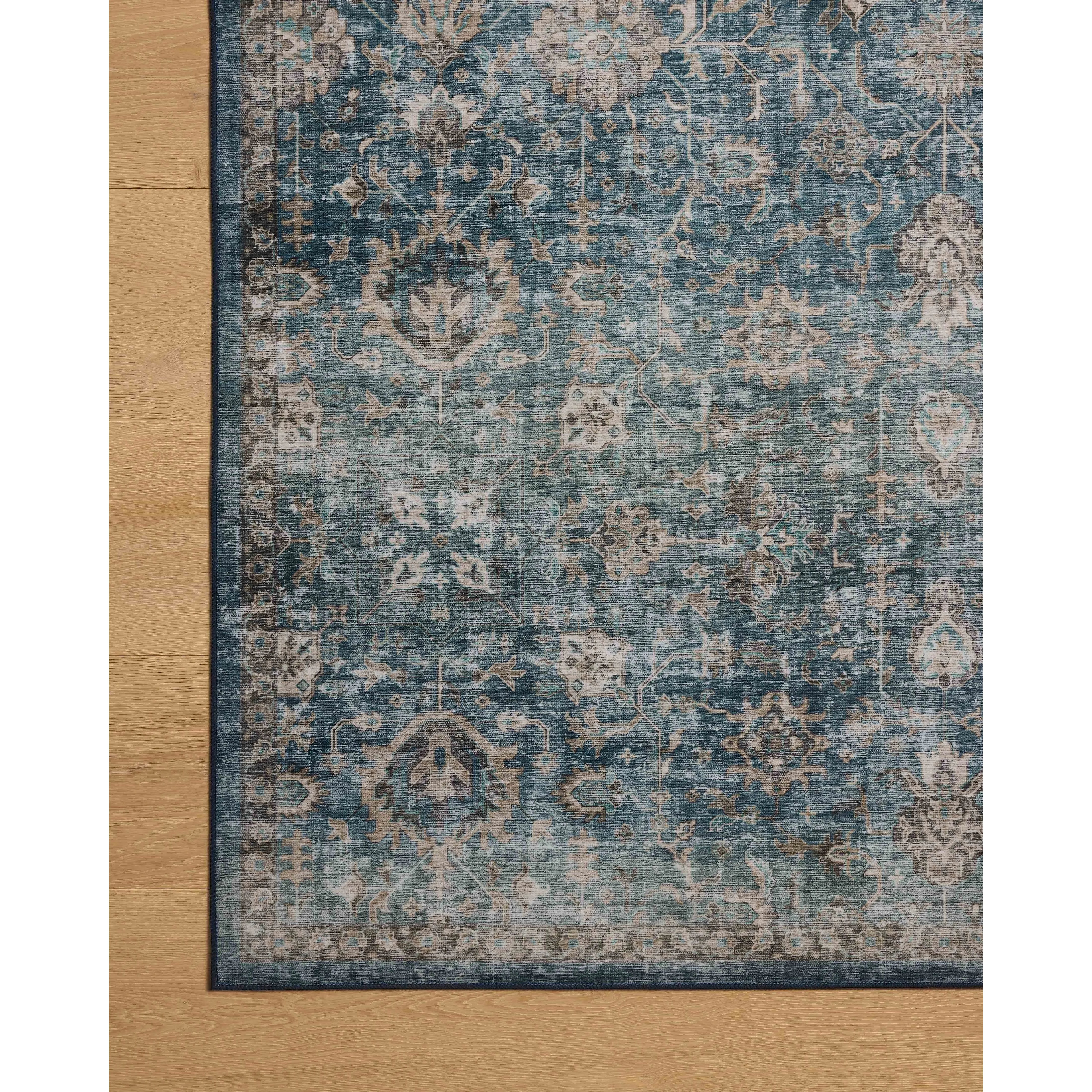 Featuring Anniston Machine Washable Lagoon / Natural Rug by Loloi at Amethyst Home. The Anniston Collection is a washable rug with traditional motifs in beautifully saturated and distressed tones. This durable area rug is power-loomed of polyester in China and designed for the busiest rooms of the home—living rooms, bedrooms, kitchens, hallways, and mor. Amethyst Home provides interior design, new home construction design consulting, vintage area rugs, and lighting in the Winter Garden metro area.