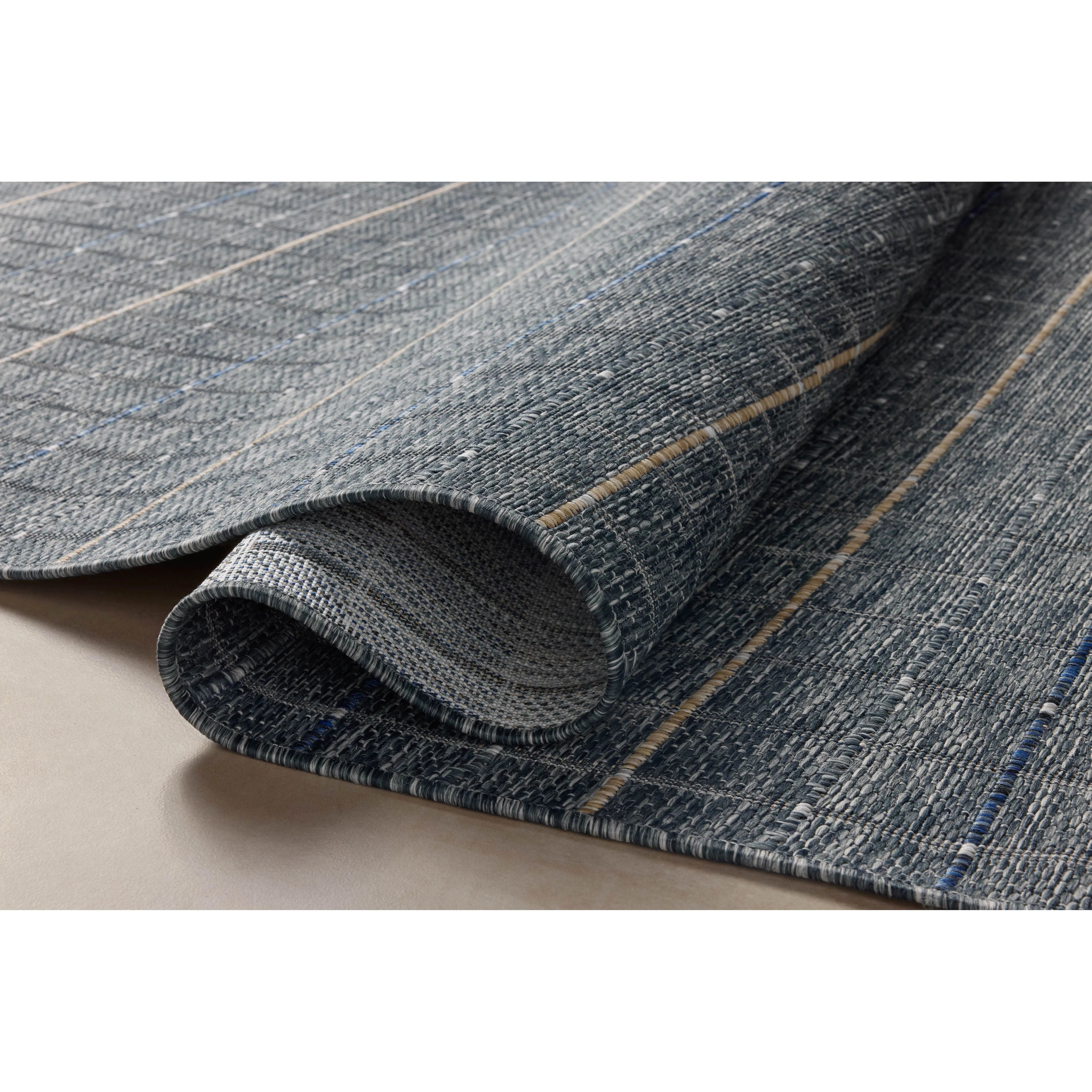 Featuring Birch Sky / Wheat Rug by Loloi at Amethyst Home. The Birch Collection is a cool-toned area rug with an understated linear design that adds casual structure to contemporary home decor. The rug is power-loomed of durable polyester, an easy-to-clean, no-shed construction for the busiest rooms of the home. The Birch Collection is made in Turkey and OEKO. Amethyst Home provides interior design, new home construction design consulting, vintage area rugs, and lighting in the Houston metro area.