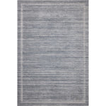 Featuring Brigette Romanek x Loloi Orly Denim Rug by Loloi at Amethyst Home. Irresistible to walk upon, the Dana Denim Rug by Brigette Romanek x Loloi has a high-low texture that alternates between a subtly shaggy pile and a soft base. Horizontal broken stripes give the area rug a fresh and energized structure, while a finish of fringe along the edges accent. Amethyst Home provides interior design, new home construction design consulting, vintage area rugs, and lighting in the Portland metro area.