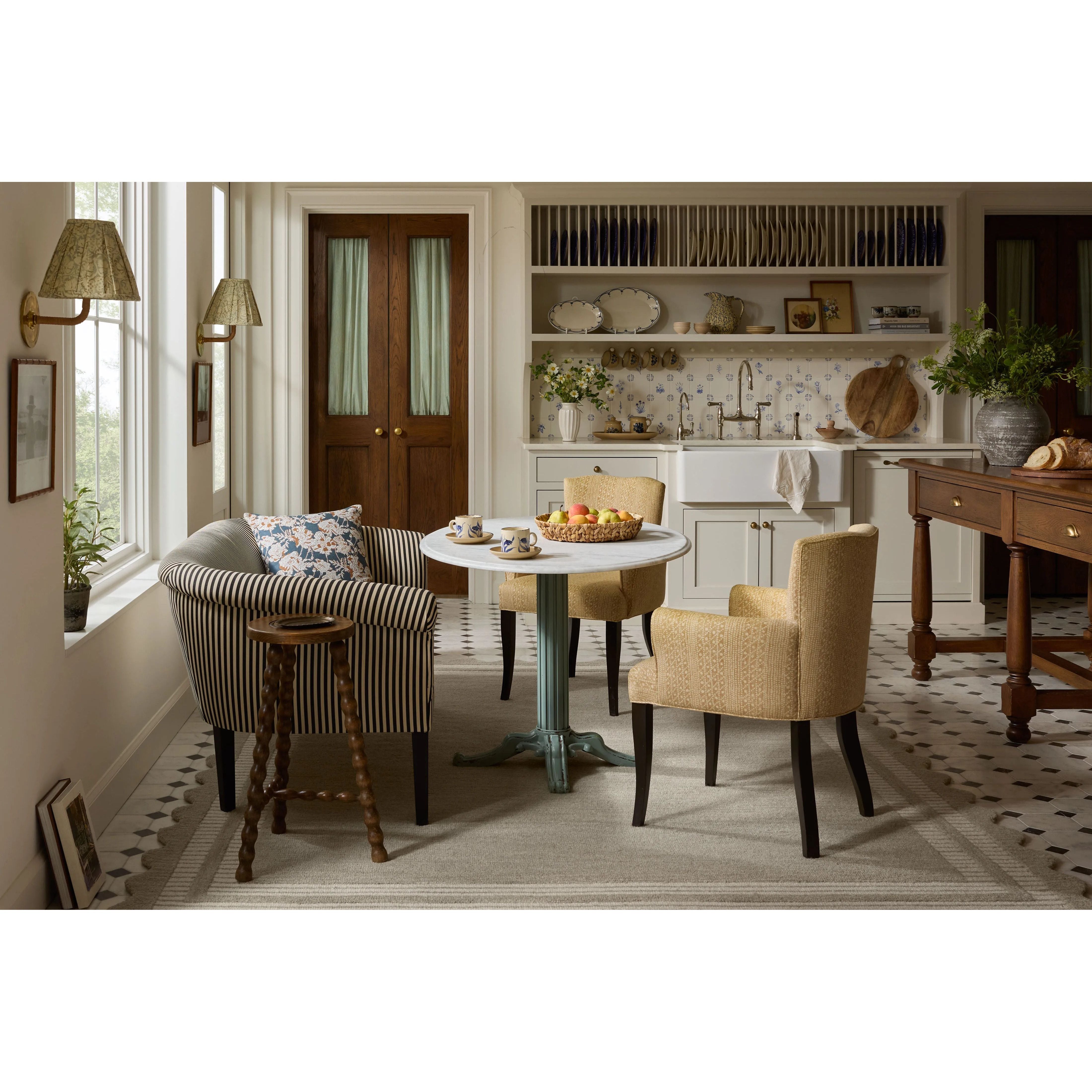 Featuring Chris Loves Julia × Loloi Scottie Fog / Ivory Rug by Loloi at Amethyst Home. The Scottie Collection from Chris Loves Julia x Loloi is a hand-tufted wool area rug with a playful scalloped edge and lower-pile, striped border for a touch of structure. The rugs overall pile is thick and plush, available in easygoing earth tones and neutral colorways. Th. Amethyst Home provides interior design, new home construction design consulting, vintage area rugs, and lighting in the Houston metro area.