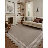 Featuring Chris Loves Julia × Loloi Scottie Fog / Ivory Rug by Loloi at Amethyst Home. The Scottie Collection from Chris Loves Julia x Loloi is a hand-tufted wool area rug with a playful scalloped edge and lower-pile, striped border for a touch of structure. The rugs overall pile is thick and plush, available in easygoing earth tones and neutral colorway. Amethyst Home provides interior design, new home construction design consulting, vintage area rugs, and lighting in the Laguna Beach metro area.