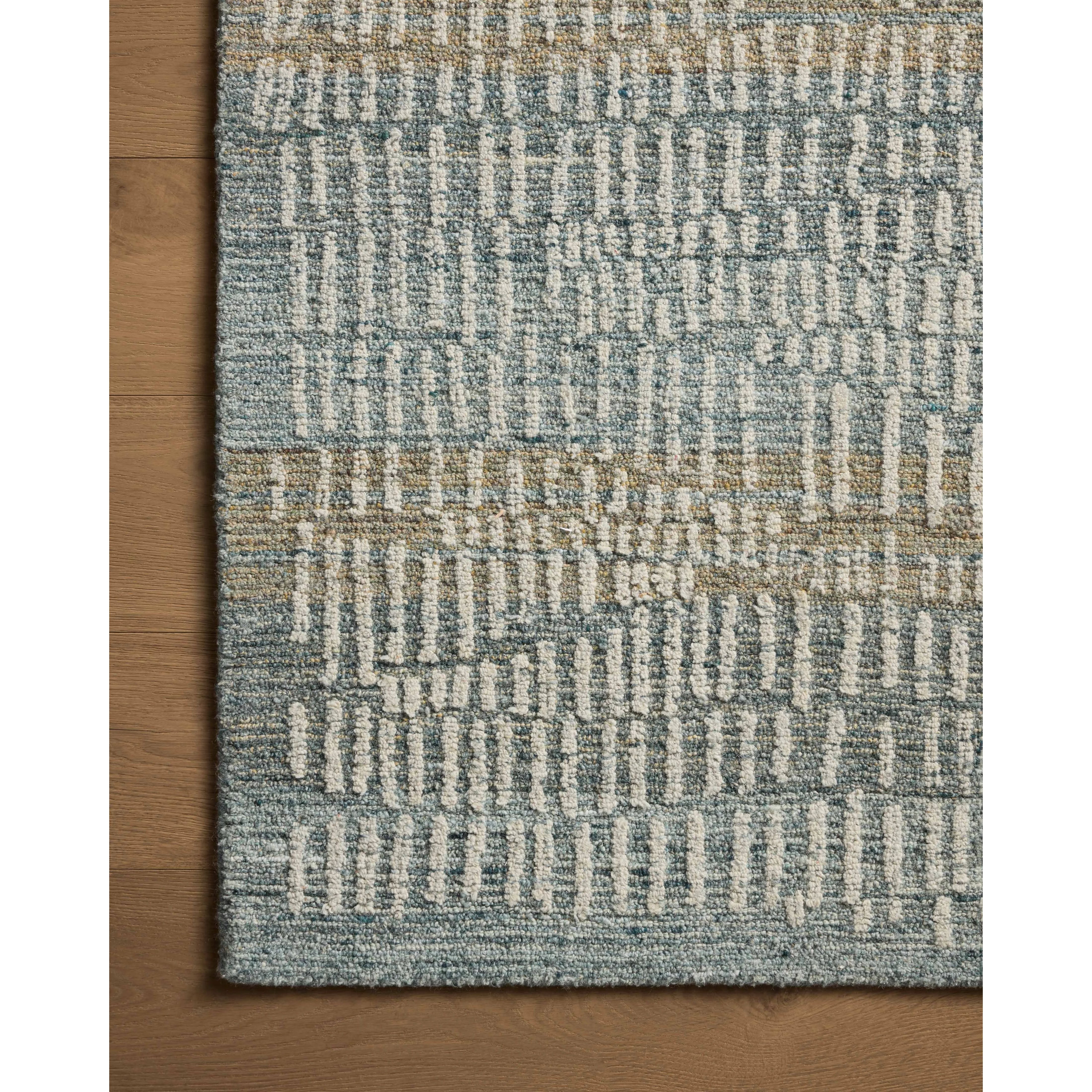 Featuring Elias Ocean / Oatmeal Rug by Loloi at Amethyst Home. The Elias Ocean / Oatmeal Rug is a hand-tufted wool area rug with lively graphic patterns in earth and stone tones. There’s a unique texture to the rug made by over-tufting, in which a design is hand-tufted over a tufted base, creating a subtle high-low pile. This collection is made in India and. Amethyst Home provides interior design, new home construction design consulting, vintage area rugs, and lighting in the Calabasas metro area.