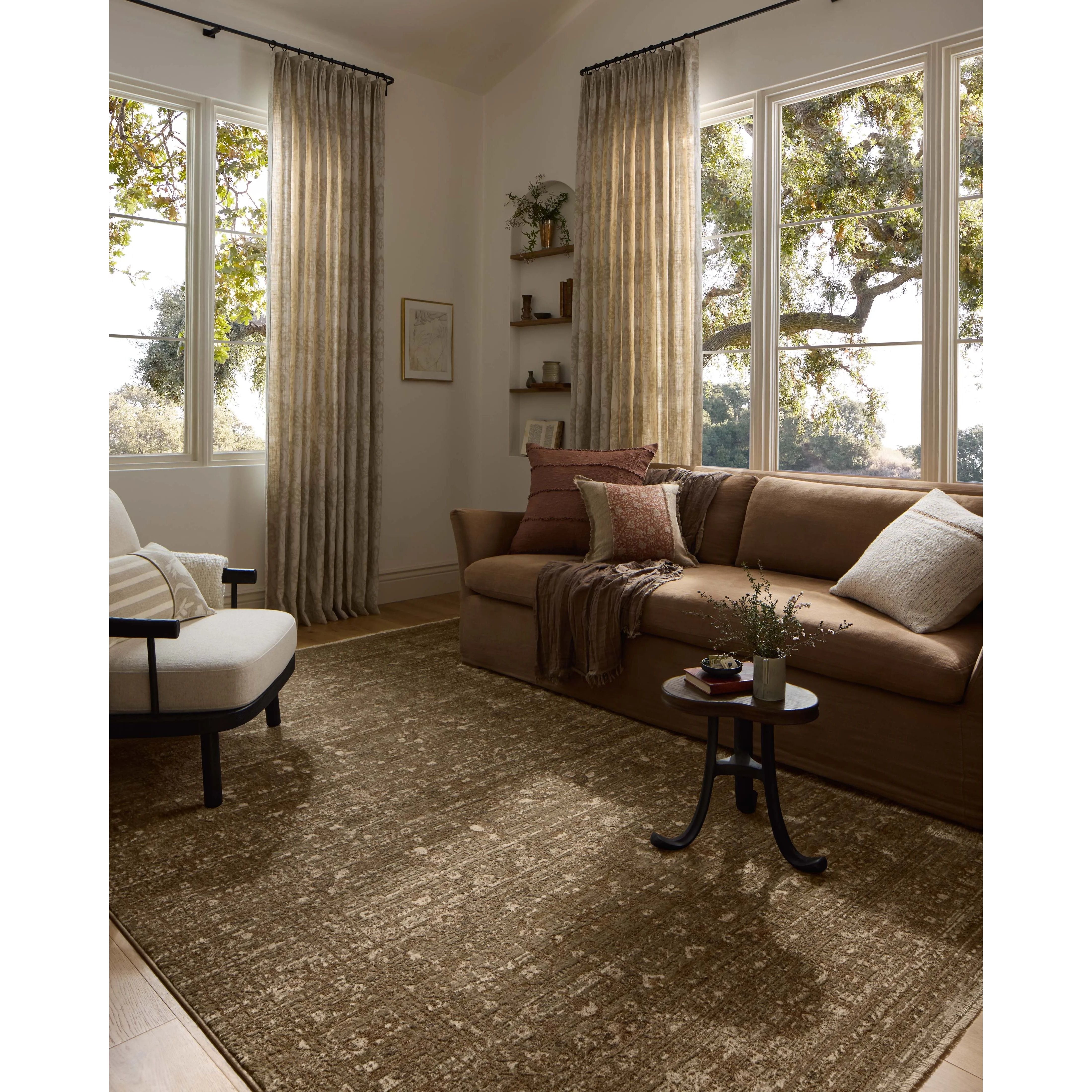 Featuring Haywood Brown Rug by Loloi at Amethyst Home. The Haywood Collection is an easy-to-clean, earth-toned area rug with a subtly distressed traditional design. Haywood is power-loomed of polyester in Turkey, a durable area rug for a living room, bedroom, dining room, or other high-traffic spaces.  Power Loomed  HYD-01 Loloi Ii x Loloi Brown. Amethyst Home provides interior design, new home construction design consulting, vintage area rugs, and lighting in the Scottsdale metro area.