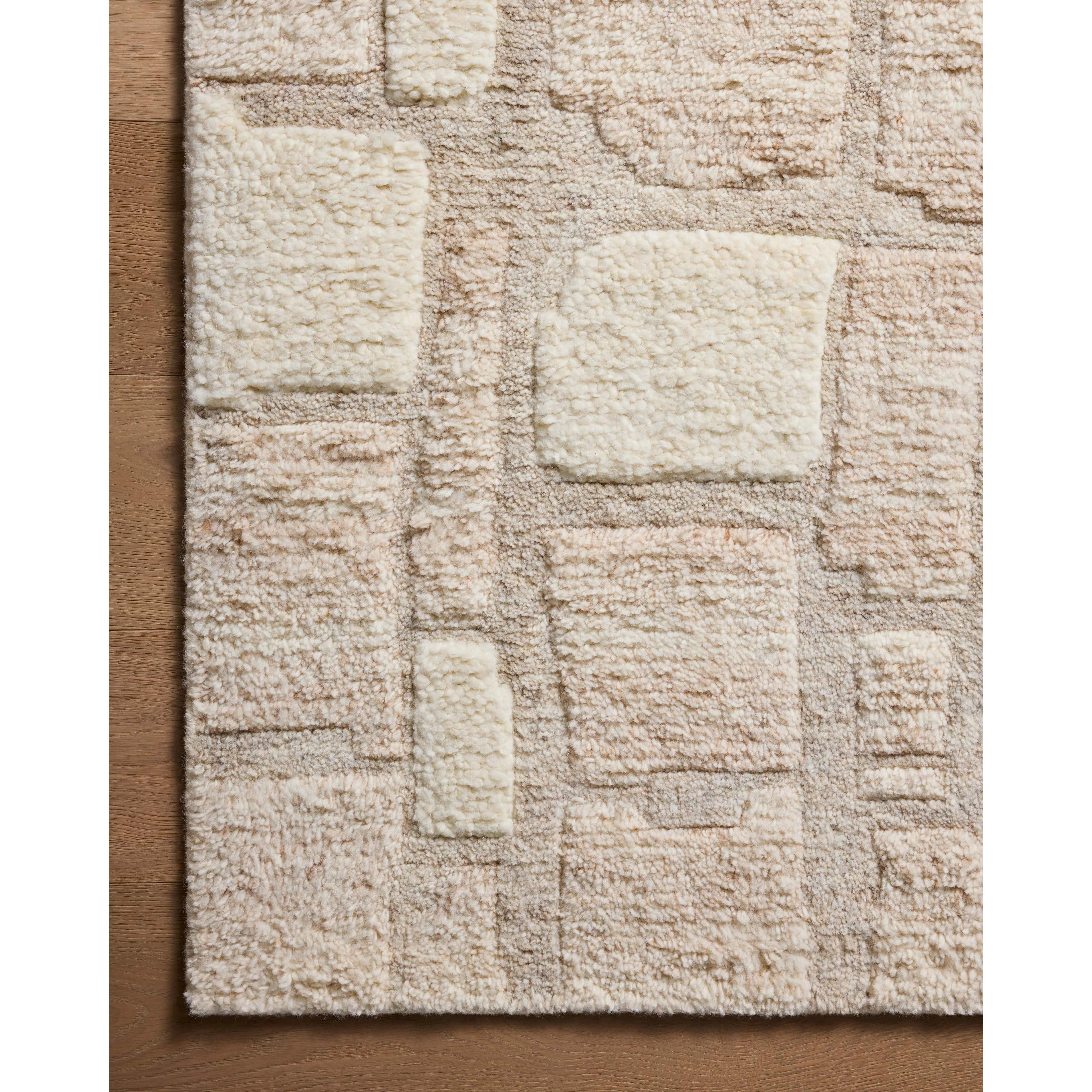 Featuring Octavia Stone / Sand Rug by Loloi at Amethyst Home. Inspired by classic Moroccan rug motifs and nature's asymmetry, area rugs in the Octavia Collection make a timeless statement. This hand-knotted design plays with pile height and shapes while adding the warmth of wool in a fresh, natural palette. Made in India and GoodWeave-certified, ensuring. Amethyst Home provides interior design, new home construction design consulting, vintage area rugs, and lighting in the Laguna Beach metro area.