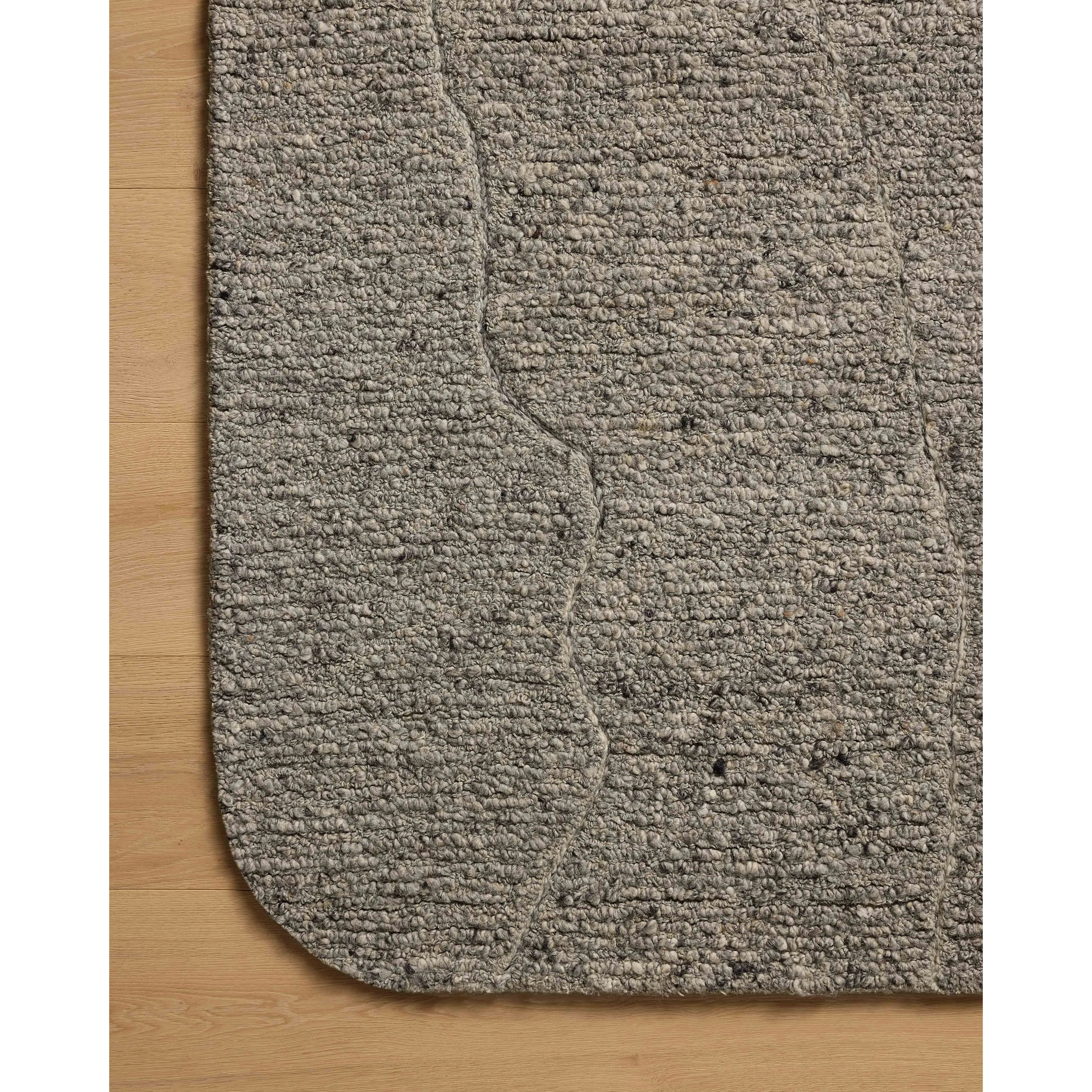 Featuring Otis Mist / Grey Rug by Loloi at Amethyst Home. The Otis Collection is a hand-tufted area rug with an organic design and uniquely rounded edges. This design-forward collection features loose linear patterns in heathered, natural colors to ground living rooms, bedrooms, dining rooms, and more. This collection is hand-tufted of wool and other fibers i. Amethyst Home provides interior design, new home construction design consulting, vintage area rugs, and lighting in the Seattle metro area.