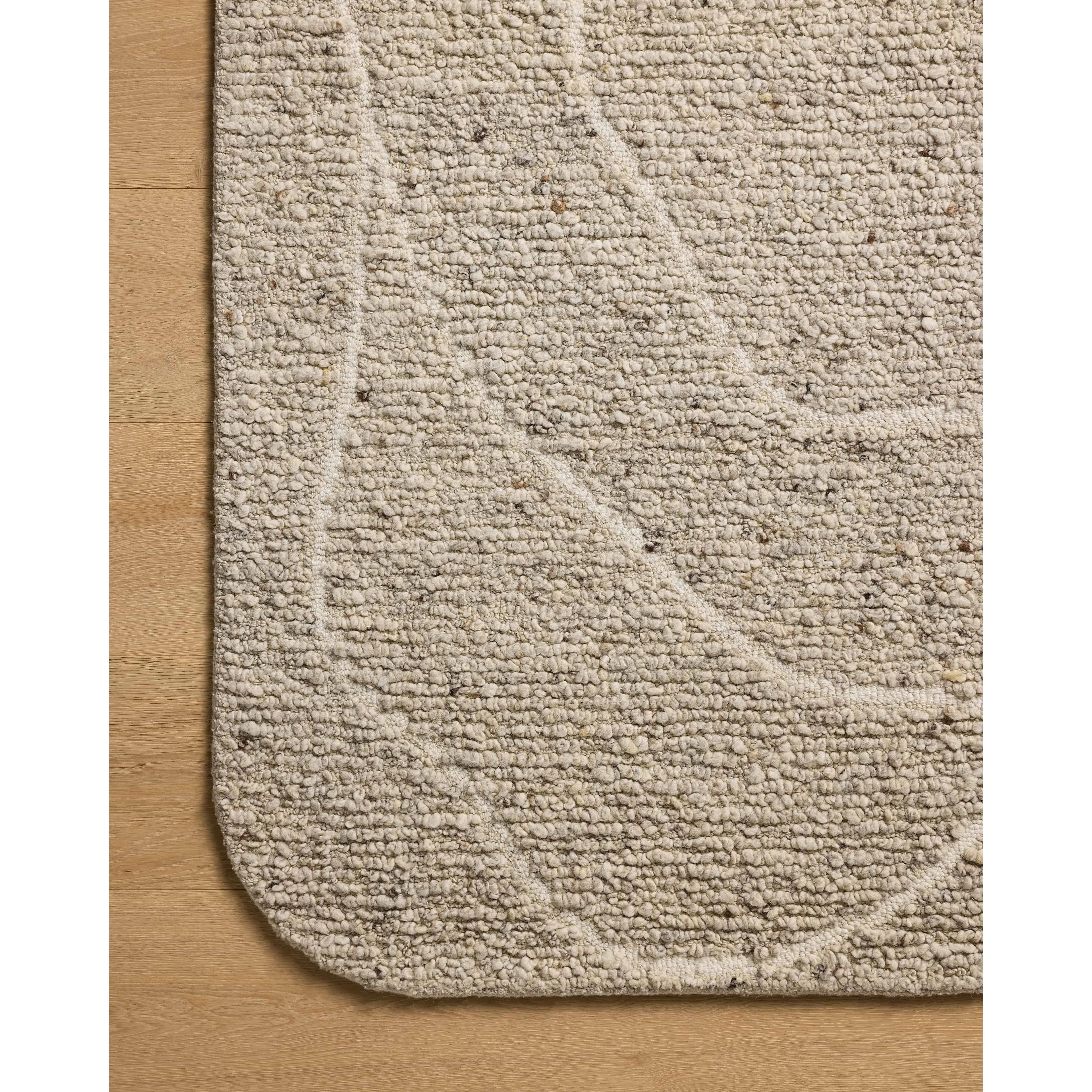 Featuring Otis Oatmeal / Ivory Rug by Loloi at Amethyst Home. The Otis Collection is a hand-tufted area rug with an organic design and uniquely rounded edges. This design-forward collection features loose linear patterns in heathered, natural colors to ground living rooms, bedrooms, dining rooms, and more. This collection is hand-tufted of wool and other fibe. Amethyst Home provides interior design, new home construction design consulting, vintage area rugs, and lighting in the Seattle metro area.