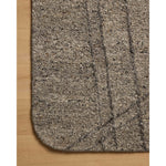 Featuring Otis Stone / Pebble Rug by Loloi at Amethyst Home. The Otis Collection is a hand-tufted area rug with an organic design and uniquely rounded edges. This design-forward collection features loose linear patterns in heathered, natural colors to ground living rooms, bedrooms, dining rooms, and more. This collection is hand-tufted of wool and other fi. Amethyst Home provides interior design, new home construction design consulting, vintage area rugs, and lighting in the Des Moines metro area.