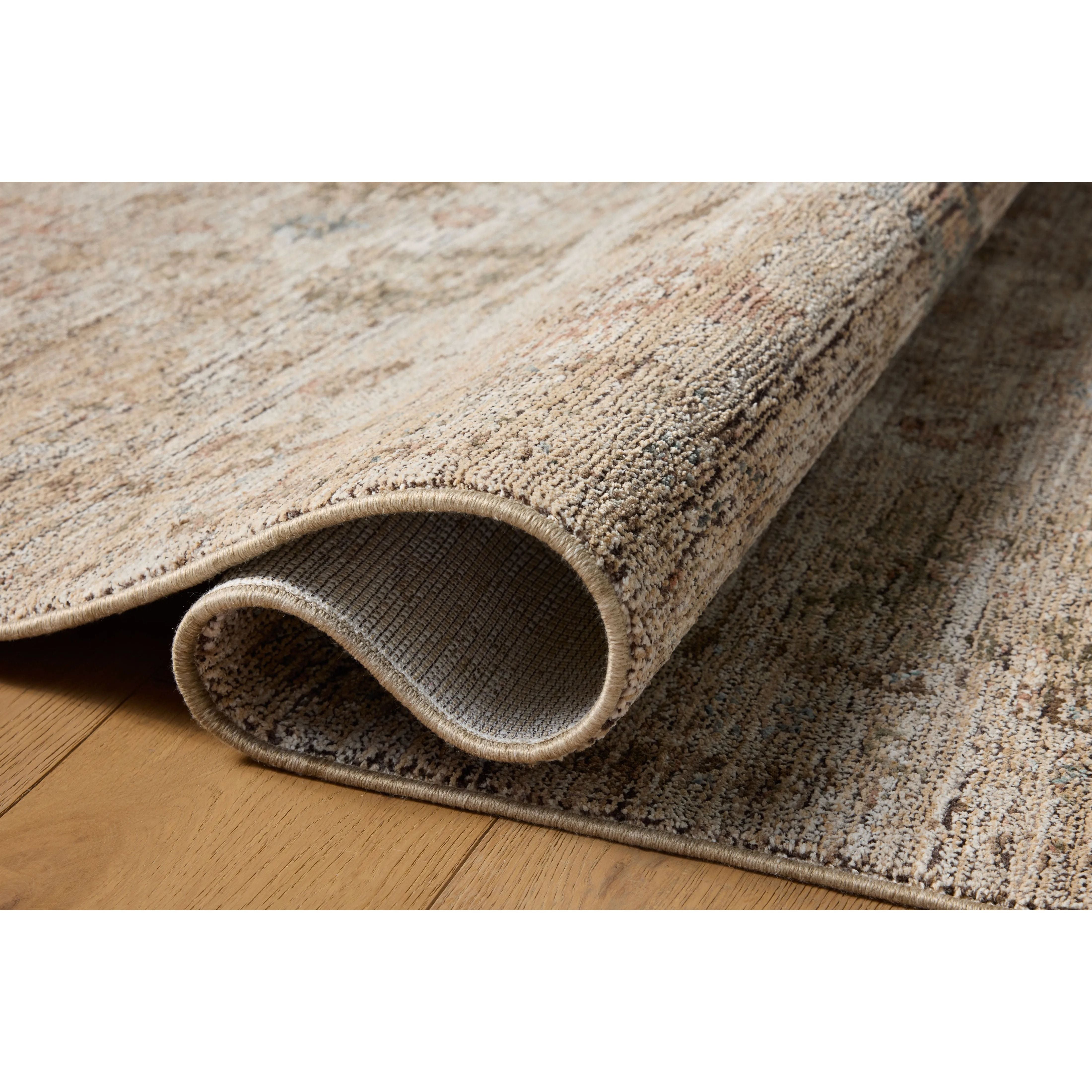 Featuring Priscilla Ivory / Multi Rug by Loloi at Amethyst Home. Transform your living space into a luxurious retreat with the Priscilla Bark/Ivory Rug. Made of premium materials, this rug adds elegance and sophistication to any room. Its soft, textured surface and neutral color palette create a cozy and inviting atmosphere. Elevate your home decor with thi. Amethyst Home provides interior design, new home construction design consulting, vintage area rugs, and lighting in the Calabasas metro area.