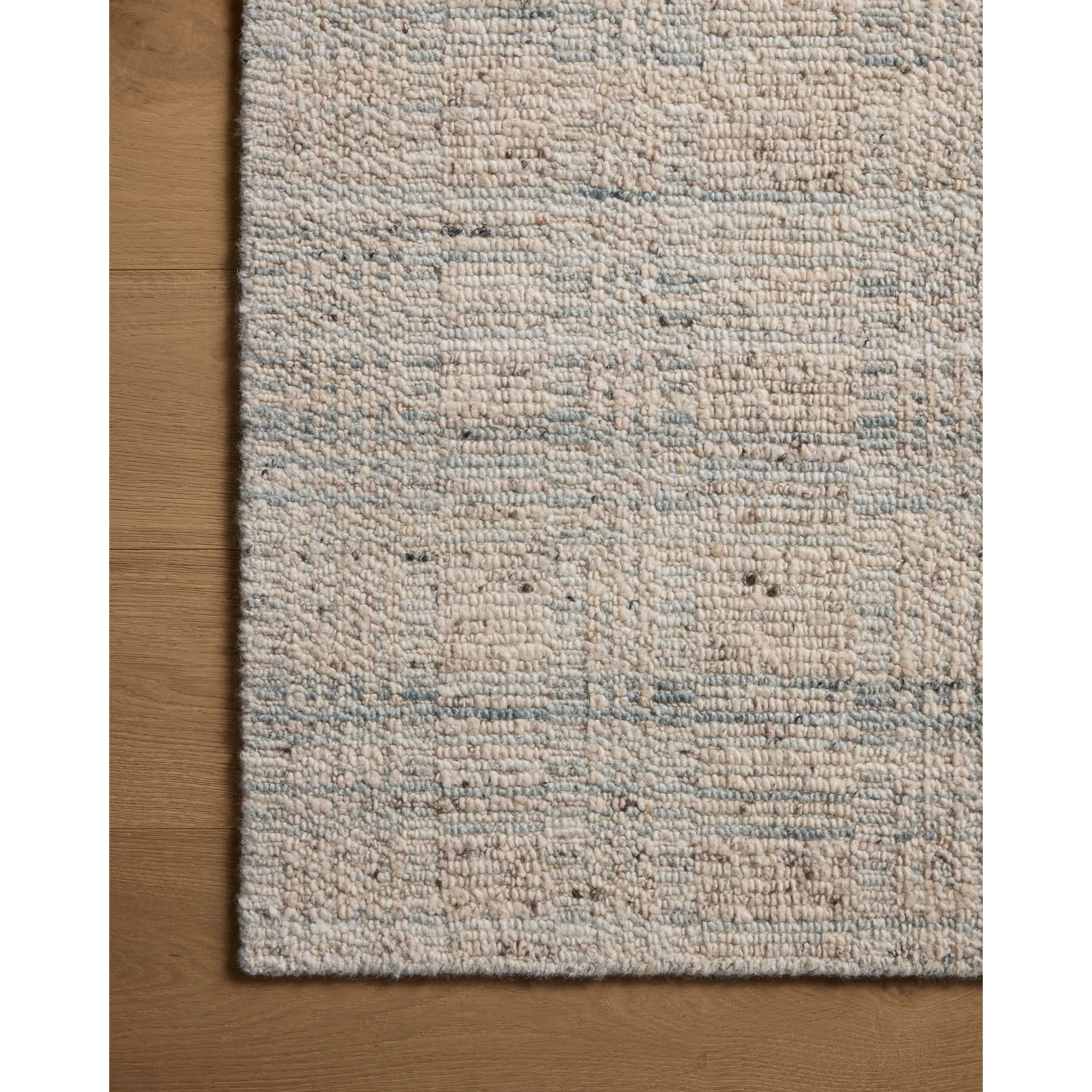 Featuring Sonya Mist / Oatmeal Rug by Loloi at Amethyst Home. The Sonya Mist / Oatmeal Rug is a hand-loomed area rug with a light, airy palette and understated graphic design. The rug’s textural pile is a soft blend of wool and nylon that creates dimension in living rooms, bedrooms, and more. This collection is made in India and GoodWeave-certified, ensurin. Amethyst Home provides interior design, new home construction design consulting, vintage area rugs, and lighting in the Charlotte metro area.
