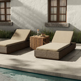 Featuring Lorelei Alessi Buff Outdoor Chaise by Four Hands at Amethyst Home. A slim, stylish profile invites outdoor lounging. The woven box base frames durable, outdoor-friendly cushioning in soft buff. An adjustable back offers personalized comfort, while the wooden plinth elevates the sleek design. Cover or store indoors during inclement weather and when not in use.Overall Dimensi. Amethyst Home provides interior design, new construction, custom furniture, and area rugs in the Boston metro area