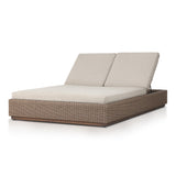 Featuring Lorelei Alessi Buff Outdoor Double Chaise by Four Hands at Amethyst Home. A slim, stylish profile made for lounging. A woven box base frames durable, outdoor-friendly cushioning in soft buff. An adjustable back offers personalized comfort, while a wooden plinth elevates this sleek design. Cover or store indoors during inclement weather and when not in use.Overall Dimensi. Amethyst Home provides interior design, new construction, custom furniture, and area rugs in the Calabasas metro area