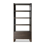 Featuring Orwin Smoked Black Oak Bookshelf by Four Hands at Amethyst Home. A stunner from every angle. Crafted from a mix of solid oak and thick oak veneer, this generous bookcase features chamfered edges along the shelves and angled outer legs for lots of movement. Finished in a smoked black oak finish.Overall Dimensions: 44.00"w x 18.00"d x 94.00"hWeight : 253.53 lbsMaterials : . Amethyst Home provides interior design, new construction, custom furniture, and area rugs in the Nashville metro area