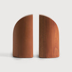 Featuring Pi Mahogany Book Ends by Ethnicraft at Amethyst Home. The PI collection honours nature’s design by keeping the strength, curves and lines, as nature intended. Each PI book end is finished by hand to ensure that the individual character of the wood is respected. Interesting shapes are discovered in this sleek and stylish, polished imperfect, finish. Designed by Alain van. Amethyst Home provides interior design, new construction, custom furniture, and area rugs in the Alpharetta metro area