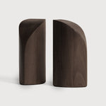 Featuring Pi Mahogany Dark Brown Book Ends by Ethnicraft at Amethyst Home. The PI collection honours nature’s design by keeping the strength, curves and lines, as nature intended. Each PI book end is finished by hand to ensure that the individual character of the wood is respected. Interesting shapes are discovered in this sleek and stylish, polished imperfect, finish. Designed b. Amethyst Home provides interior design, new construction, custom furniture, and area rugs in the Des Moines metro area