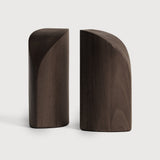 Featuring Pi Mahogany Dark Brown Book Ends by Ethnicraft at Amethyst Home. The PI collection honours nature’s design by keeping the strength, curves and lines, as nature intended. Each PI book end is finished by hand to ensure that the individual character of the wood is respected. Interesting shapes are discovered in this sleek and stylish, polished imperfect, finish. Designed b. Amethyst Home provides interior design, new construction, custom furniture, and area rugs in the Des Moines metro area