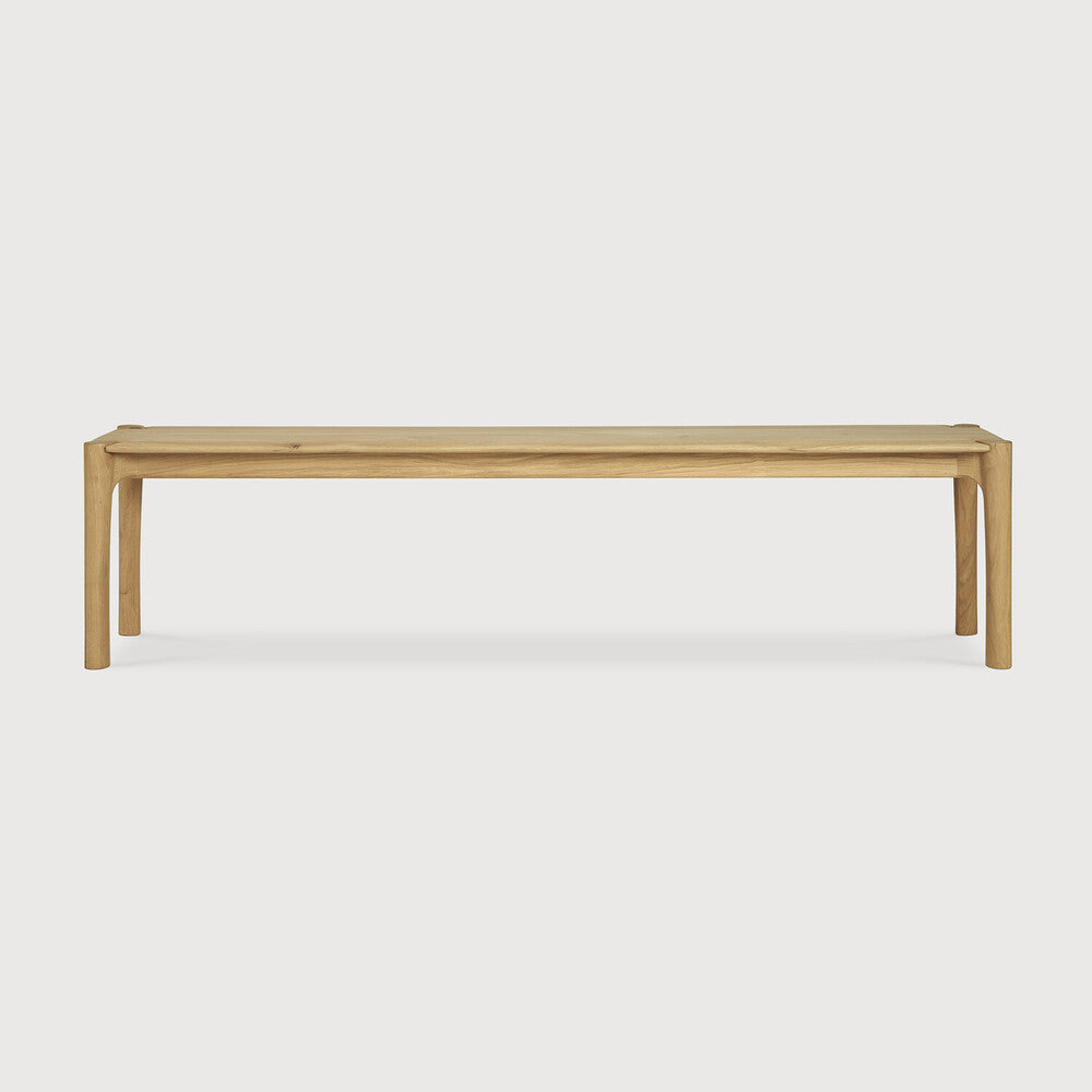 Featuring Pi Oak Bench by Ethnicraft at Amethyst Home. The PI collection honours nature’s design by keeping the strength, curves and lines, as nature intended. Interesting shapes are discovered in this sleek and stylish, polished imperfect, finish. Each PI item is finished by hand to ensure that the individual character of the wood is respected. The PI bench pairs well with the PI di. Amethyst Home provides interior design, new construction, custom furniture, and area rugs in the Austin metro area
