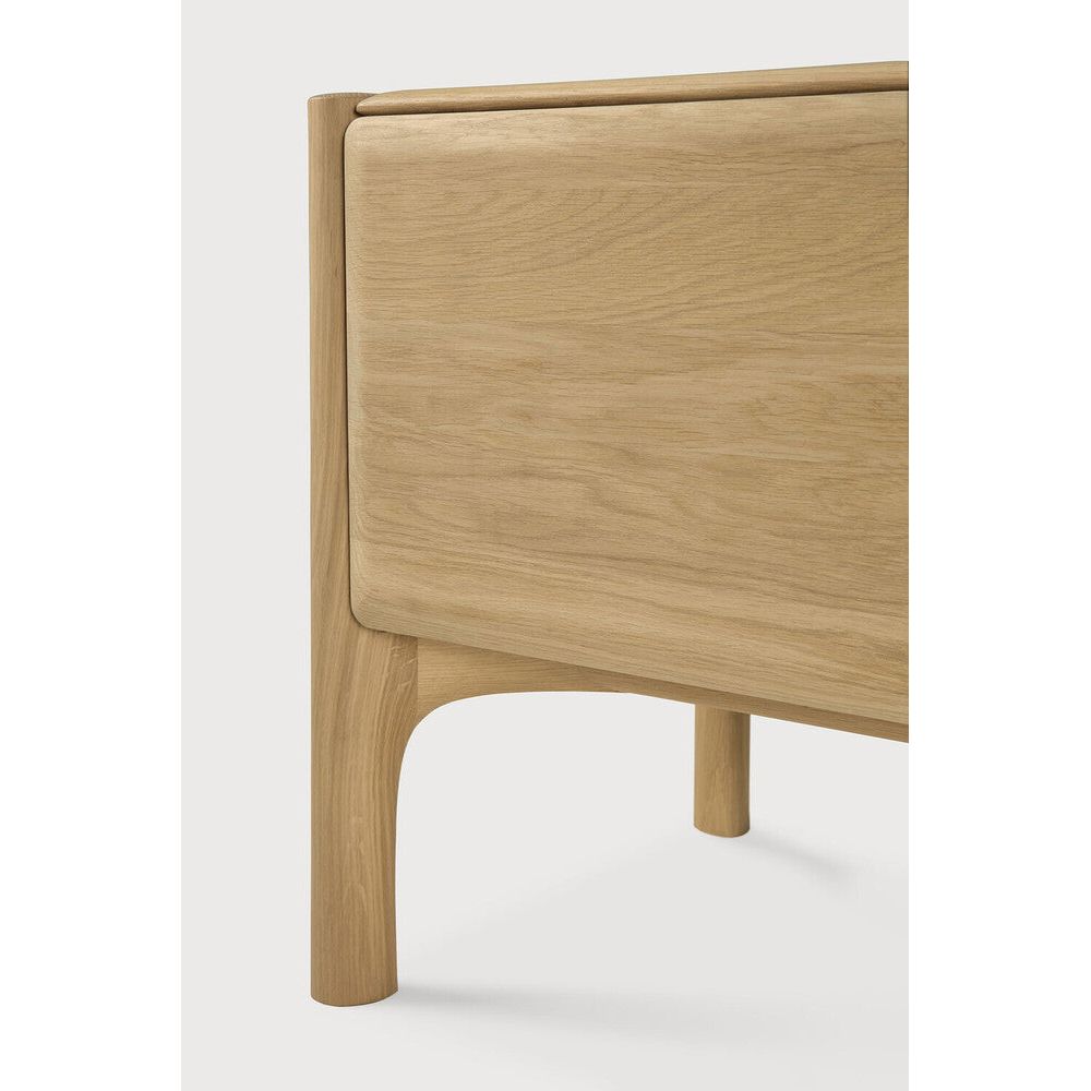 Featuring Pi Oak Tv Cupboard by Ethnicraft at Amethyst Home. The PI collection honours nature’s design by keeping the strength, curves and lines, as nature intended. Interesting shapes are discovered in this sleek and stylish, polished imperfect, finish. Each PI item is finished by hand to ensure that the individual character of the wood is respected. The PI TV cupboard is strikin. Amethyst Home provides interior design, new construction, custom furniture, and area rugs in the Charlotte metro area