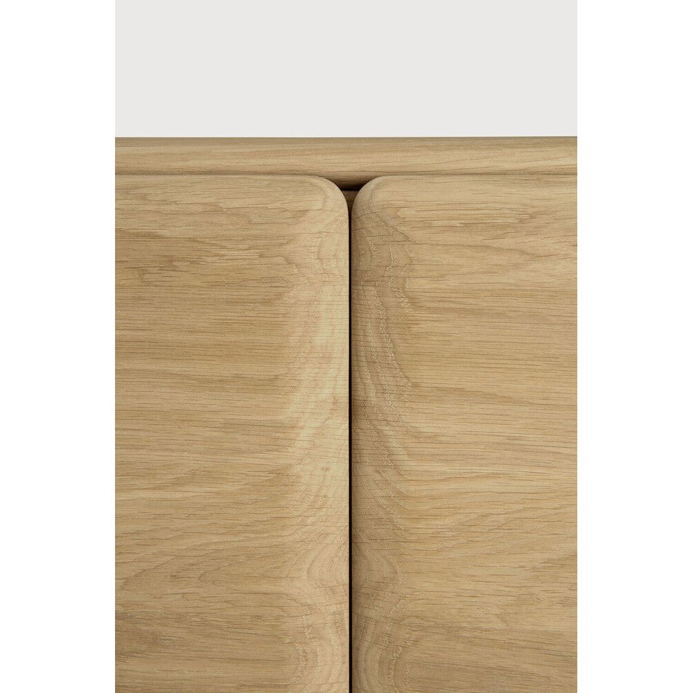 Featuring Pi Oak Tv Cupboard by Ethnicraft at Amethyst Home. The PI collection honours nature’s design by keeping the strength, curves and lines, as nature intended. Interesting shapes are discovered in this sleek and stylish, polished imperfect, finish. Each PI item is finished by hand to ensure that the individual character of the wood is respected. The PI TV cupboard is striking an. Amethyst Home provides interior design, new construction, custom furniture, and area rugs in the Omaha metro area