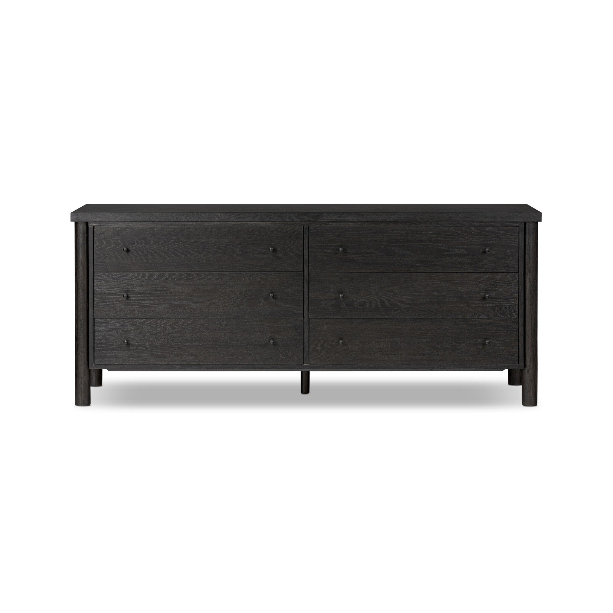 Featuring Roark Ebony Oak Veneer 6 Drawer Dresser by Four Hands at Amethyst Home. Rounded, chunky dowel legs in an ebony oak finish support the overhang top of this dresser. Six drawers provide ample storage, finished with simple gunmetal hardware.Overall Dimensions: 75.00"w x 20.00"d x 31.50"hWeight : 260.14 lbsMaterials : Oak Veneer, Solid Oak. Amethyst Home provides interior design, new construction, custom furniture, and area rugs in the Los Angeles metro area