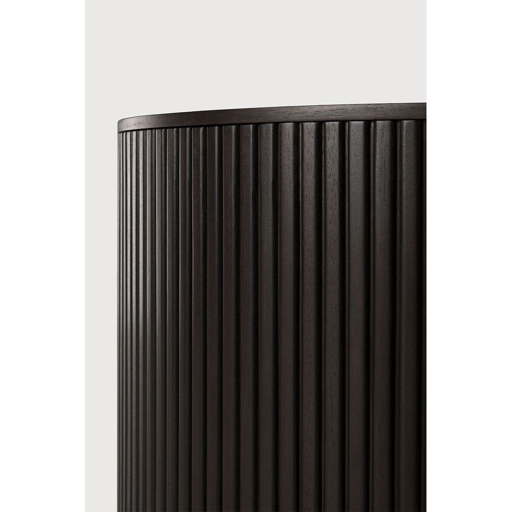 Designed by Jacques Deneef, the Roller Max is a clever multifunctional item that combines a coffee table with storage.  Encapsulated in its stacked wood-stick effect, the tabletop can be easily removed to hide the newspapers, toys, cushions and throws from daily life. The perfect solution for smaller living.
The tabletop can be removed to store objects inside the table. Amethyst Home provides interior design, new construction, custom furniture, and area rugs in the San Diego metro area