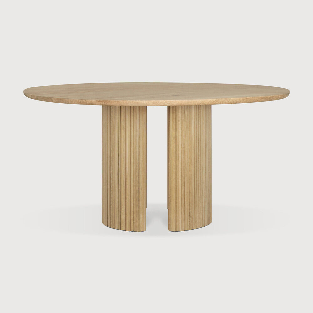 Featuring Roller Oak Round Max Dining Table by Ethnicraft at Amethyst Home. The Roller Max collection is remarkable in its design, distinguished with its stacked wood-stick effect. The dining table perfectly melds form with function. Featuring the option of reversable legs that can change the aesthetic to reflect personal style.Weight : 163 lbs Dimensions: 59.5" W x 59.5" L x 3. Amethyst Home provides interior design, new construction, custom furniture, and area rugs in the Laguna Beach metro area
