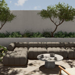 Featuring Roma Alessi Fawn Outdoor 4-Piece Sectional by Four Hands at Amethyst Home. A modern take on mid-century Italian design, soft volume and exaggerated proportions fuse for a sculpted look and playful feel. Atop a plinth-style teak base, outdoor-friendly four-piece sectional features dramatic tufting for a padded sit, indoors and out. Sustainably made with zero waste, luxurious. Amethyst Home provides interior design, new construction, custom furniture, and area rugs in the Dallas metro area