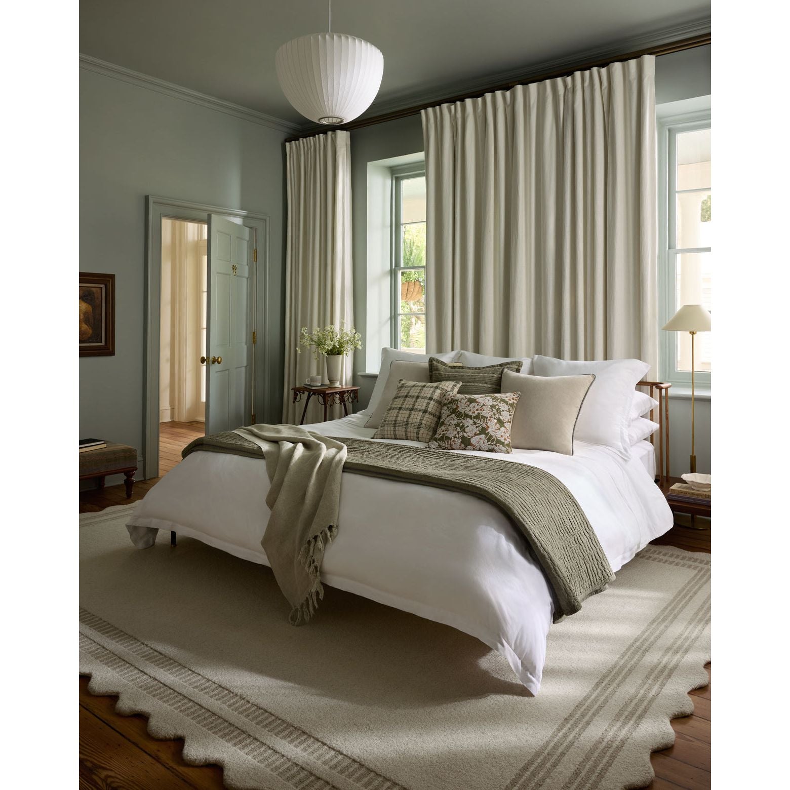 Featuring Chris Loves Julia × Loloi Scottie Ivory / Grey Rug by Loloi at Amethyst Home. The Scottie Collection from Chris Loves Julia x Loloi is a hand-tufted wool area rug with a playful scalloped edge and lower-pile, striped border for a touch of structure. The rugs overall pile is thick and plush, available in easygoing earth tones and neutral colorways. Th.  Amethyst Home provides interior design, new home construction design consulting, vintage area rugs, and lighting in the Omaha metro area.