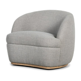 Featuring Sandie Swivel Chair - Gibson Silver by Four Hands at Amethyst Home. Textural grey performance fabric brings a design-forward feel to barrel seating atop a 360-degree swivel base of solid oak. Performance fabrics are specially created to withstand spills, stains, high traffic and wear, ensuring long-term comfort and unmatched durability.
Overall Dimens. Amethyst Home provides interior design, new home construction design consulting, vintage area rugs, and lighting in the Omaha metro area.