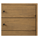 Featuring Eaton Large Nightstand - Amber-finished oak by Four Hands at Amethyst Home. Clean and streamlined. Amber-finished oak features three large drawers plus gunmetal-finished hardware, for a look that's always in style. Dark resin plays up woods' natural graining.
Overall Dimensions: 33.50"W x 18.50"L x 26"WColors: Amber Oak Resin, Dark GunmetalMaterials.  Amethyst Home provides interior design, new home construction design consulting, vintage area rugs, and lighting in the Austin metro area.