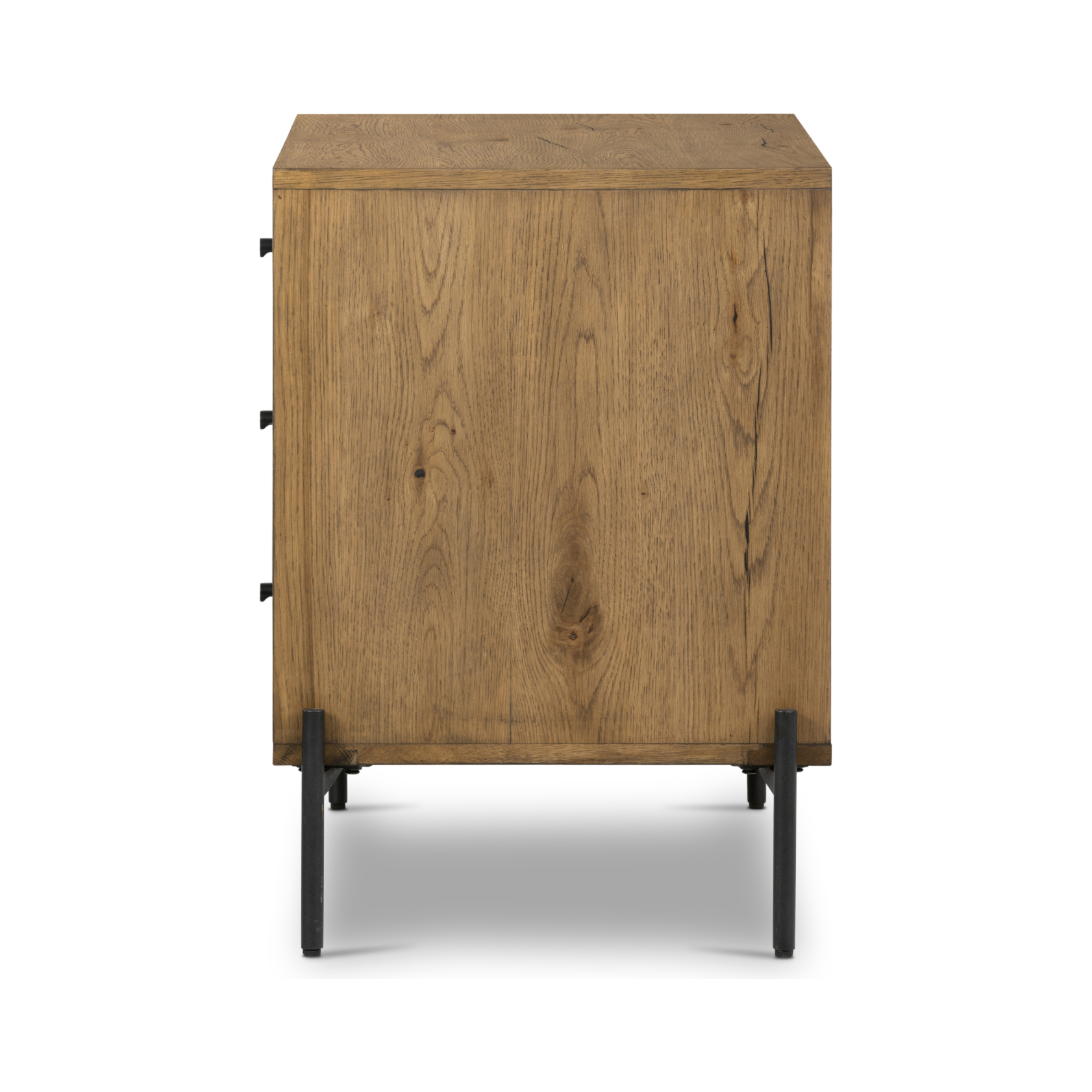 Featuring Eaton Large Nightstand - Amber-finished oak by Four Hands at Amethyst Home. Clean and streamlined. Amber-finished oak features three large drawers plus gunmetal-finished hardware, for a look that's always in style. Dark resin plays up woods' natural graining.
Overall Dimensions: 33.50"W x 18.50"L x 26"WColors: Amber Oak Resin, Dark GunmetalMaterials.  Amethyst Home provides interior design, new home construction design consulting, vintage area rugs, and lighting in the Austin metro area.