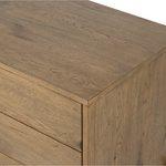 Featuring Eaton Large Nightstand - Amber-finished oak by Four Hands at Amethyst Home. Clean and streamlined. Amber-finished oak features three large drawers plus gunmetal-finished hardware, for a look that's always in style. Dark resin plays up woods' natural graining.
Overall Dimensions: 33.50"W x 18.50"L x 26"WColors: Amber Oak Resin, Dark GunmetalMaterials.  Amethyst Home provides interior design, new home construction design consulting, vintage area rugs, and lighting in the Boston metro area.