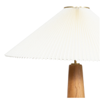 Featuring Nora Light Oak Floor Lamp by Four Hands at Amethyst Home. Modern minimal meets traditional. A tapered wood floor lamp base is topped with a design-forward pleated shade.Overall Dimensions: 28"W x 28"L x 66"HColors: Light Oak, Antique Brass, Cream LinenMaterials: Solid Oak, Steel Plating, 100% Flax/LinenWeight: 46.3 lbBulb(s) Included: YesBulb Type: L. Amethyst Home provides interior design, new home construction design consulting, vintage area rugs, and lighting in the Dallas metro area.