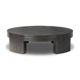 Featuring Sheffield Charcoal Oak Veneer Coffee Table by Four Hands at Amethyst Home. Made from thick, charcoal-finished oak, a rounded coffee table features four legs that pull through to the top, for an intriguing design detail.Overall Dimensions: 48.00"w x 48.00"d x 13.00"hWeight : 94.80 lbsMaterials : Oak Veneer. Amethyst Home provides interior design, new construction, custom furniture, and area rugs in the Charlotte metro area
